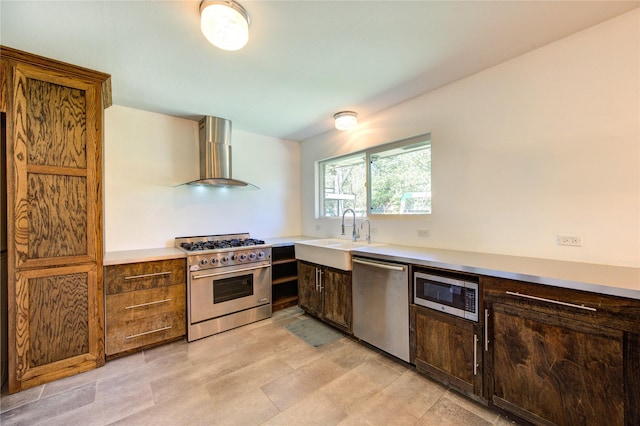4538 Warm Springs Rd, Houston, TX 77035 - kitchen with appliances with stainless steel finishes, wall chimney exhaust hood, and light countertops