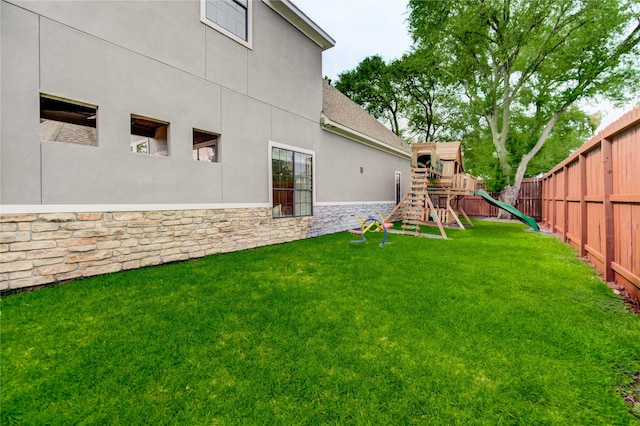 1403 Wakefield Dr, Houston, TX 77018 - fenced backyard featuring a playground