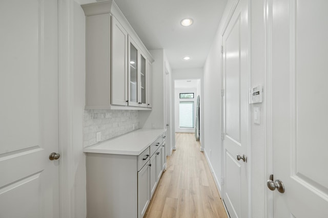 6618 Mirabeau Ln, Katy, TX 77493 - corridor with recessed lighting and light wood finished floors