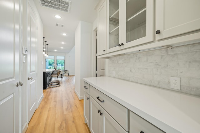 6618 Mirabeau Ln, Katy, TX 77493 - corridor featuring light wood-style flooring and recessed lighting