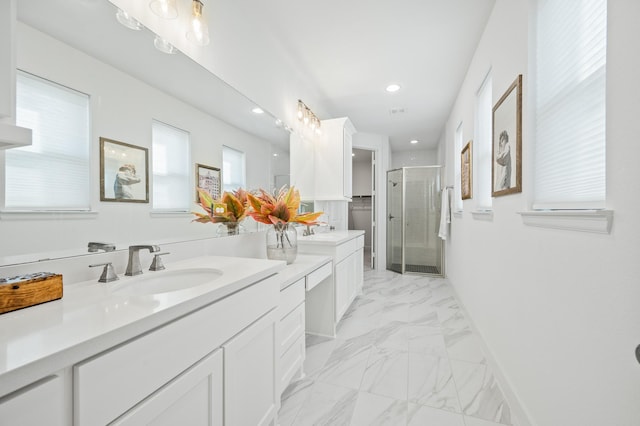 6618 Mirabeau Ln, Katy, TX 77493 - full bath with double vanity, a shower stall, marble finish flooring, and recessed lighting