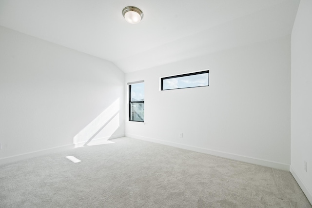 6618 Mirabeau Ln, Katy, TX 77493 - carpeted empty room featuring lofted ceiling and baseboards