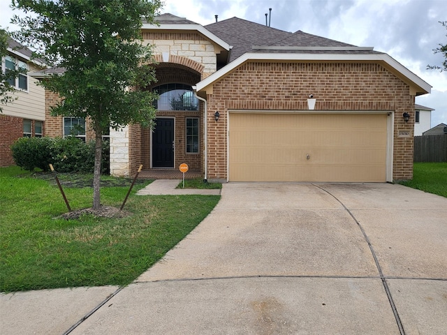 15010 Golden Summer Ct, Humble, TX 77346 - french provincial home with brick siding, driveway, a garage, and a front yard