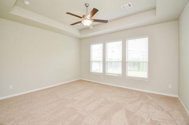 24938 Pavarotti Pl, Katy, TX 77493 - carpeted spare room with a raised ceiling, a ceiling fan, and a smoke detector
