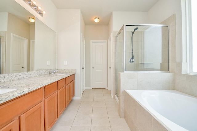 24938 Pavarotti Pl, Katy, TX 77493 - full bathroom with a bath, double vanity, tile patterned flooring, and a shower stall