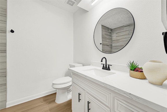 711 Charidges Dr, Houston, TX 77034 - bathroom with wood finished floors and vanity