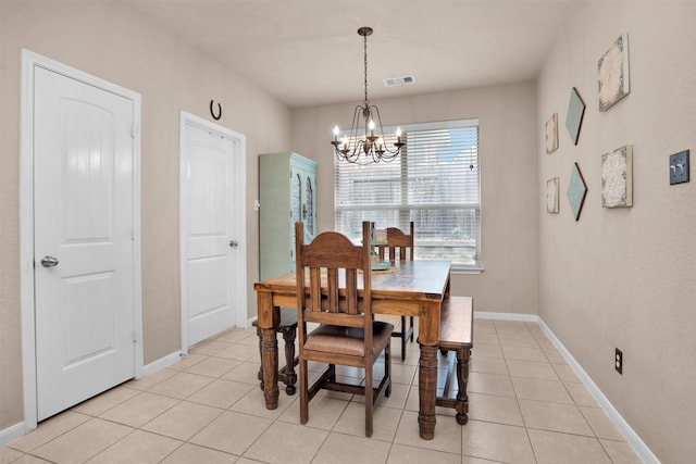 1900 Pagemill Ln, Conroe, TX 77304 - dining space featuring a chandelier and light tile patterned flooring