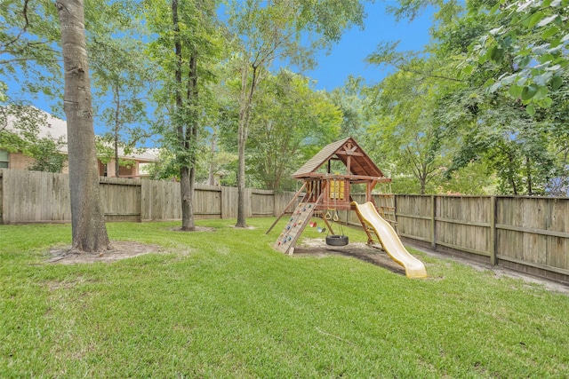 1900 Pagemill Ln, Conroe, TX 77304 - fenced backyard featuring a playground