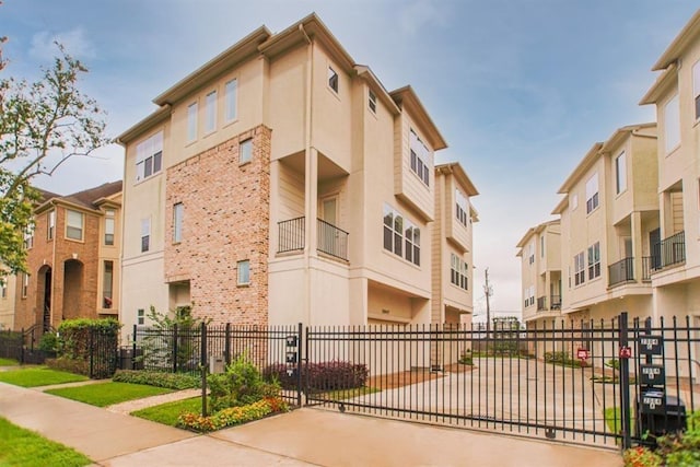 2004 Rosedale St Unit C, Houston, TX 77004 - view of building exterior featuring a fenced front yard and a residential view