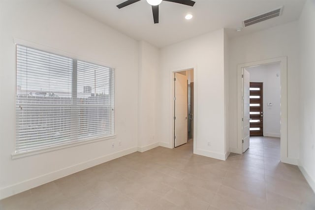2004 Rosedale St Unit C, Houston, TX 77004 - unfurnished bedroom featuring light tile patterned flooring and ceiling fan