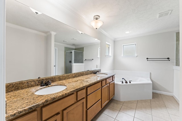 14607 Dawn Mist Ct, Magnolia, TX 77354 - full bathroom featuring a shower stall, a garden tub, tile patterned floors, double vanity, and ornamental molding
