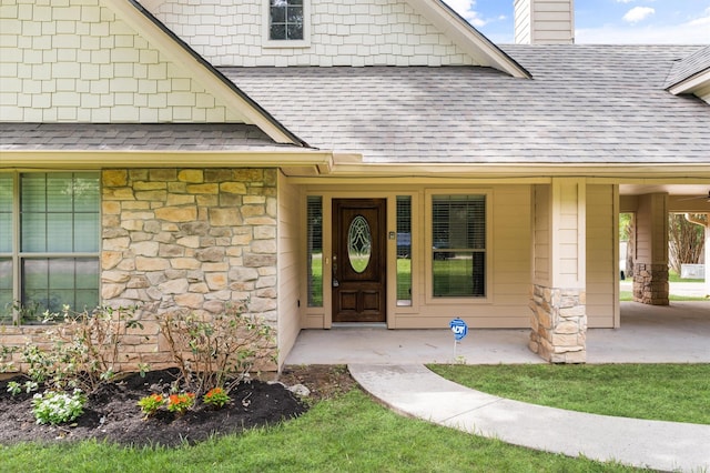 14607 Dawn Mist Ct, Magnolia, TX 77354 - doorway to property with roof with shingles, a chimney, a porch, and stone siding