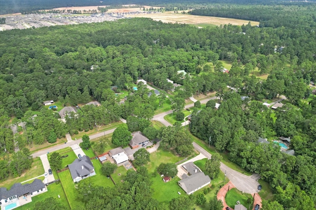14607 Dawn Mist Ct, Magnolia, TX 77354 - view of property location with a heavily wooded area