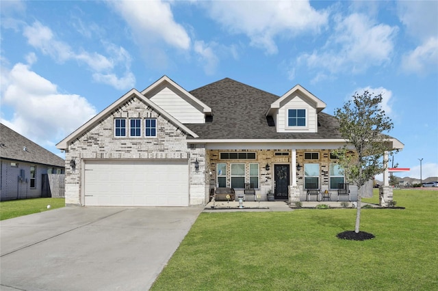 14315 Pecos Ln, Baytown, TX 77523 - view of front facade with covered porch, concrete driveway, a garage, a front yard, and roof with shingles