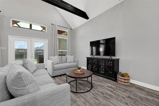 14315 Pecos Ln, Baytown, TX 77523 - living room featuring beamed ceiling, french doors, high vaulted ceiling, and wood finished floors