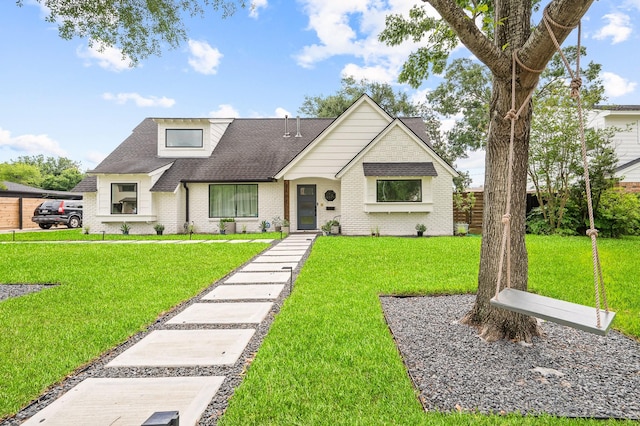 2102 Teague Rd, Houston, TX 77080 - view of front of property with brick siding, roof with shingles, and a front lawn