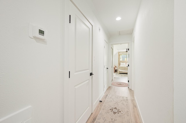 2102 Teague Rd, Houston, TX 77080 - hall with attic access, light wood-type flooring, and recessed lighting
