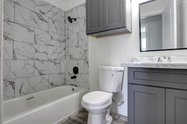 5774 Gineridge Dr, Houston, TX 77053 - full bathroom with vanity, washtub / shower combination, and wood finished floors