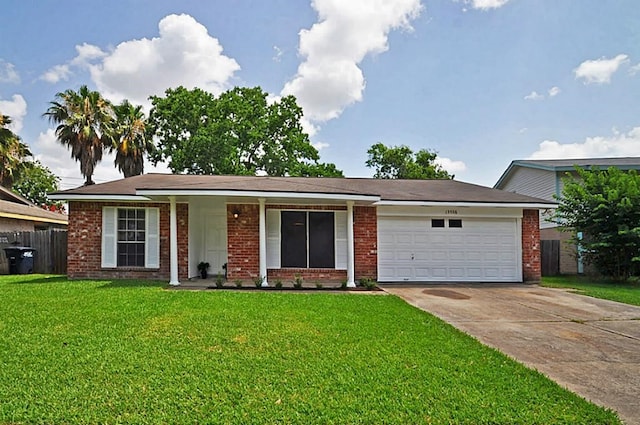 13706 Towneway Dr, Sugar Land, TX 77498 - single story home featuring brick siding, a garage, concrete driveway, and covered porch