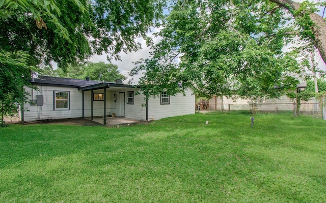 10309 Wiggins St, Houston, TX 77029 - rear view of property with a patio area