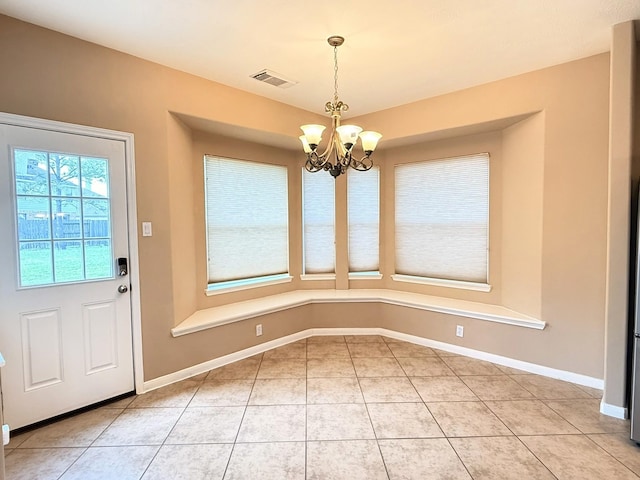 2214 Jurgensen Ln, Sugar Land, TX 77479 - unfurnished dining area with a chandelier and light tile patterned floors
