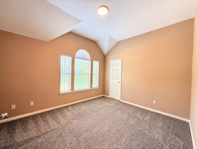 2214 Jurgensen Ln, Sugar Land, TX 77479 - unfurnished room featuring carpet flooring and vaulted ceiling