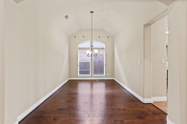 21902 Juniper Wood Ln, Richmond, TX 77469 - unfurnished dining area with a chandelier, dark wood-style flooring, and vaulted ceiling