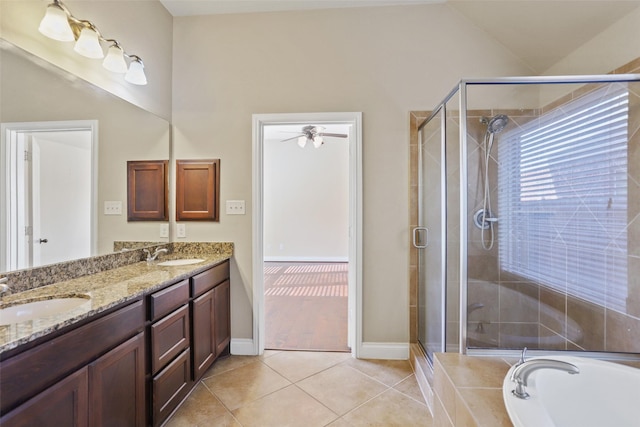 21902 Juniper Wood Ln, Richmond, TX 77469 - bathroom featuring double vanity, a shower stall, a garden tub, tile patterned flooring, and lofted ceiling