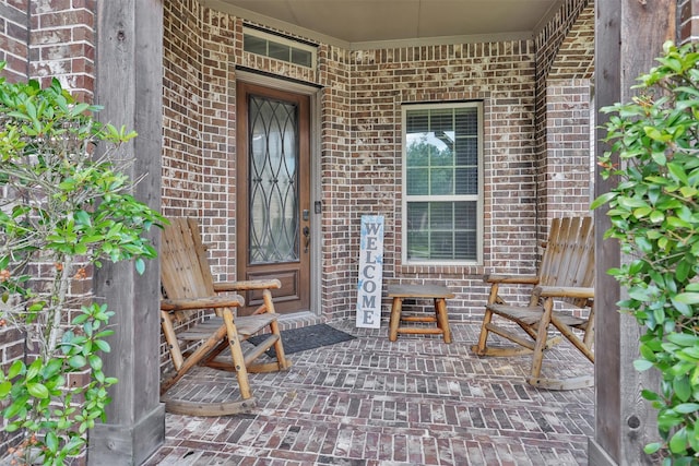 31304 New Forest Park Ln, Spring, TX 77386 - doorway to property featuring brick siding