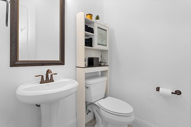 31304 New Forest Park Ln, Spring, TX 77386 - bathroom with baseboards and toilet