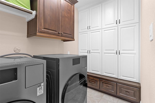 31304 New Forest Park Ln, Spring, TX 77386 - laundry room with cabinet space and washing machine and dryer