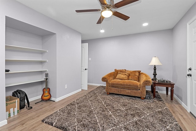31304 New Forest Park Ln, Spring, TX 77386 - living area with wood finished floors, a ceiling fan, and recessed lighting
