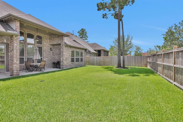 31304 New Forest Park Ln, Spring, TX 77386 - fenced backyard with a patio area