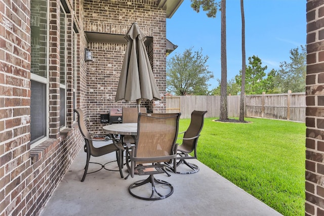31304 New Forest Park Ln, Spring, TX 77386 - fenced backyard featuring outdoor dining area and a patio area