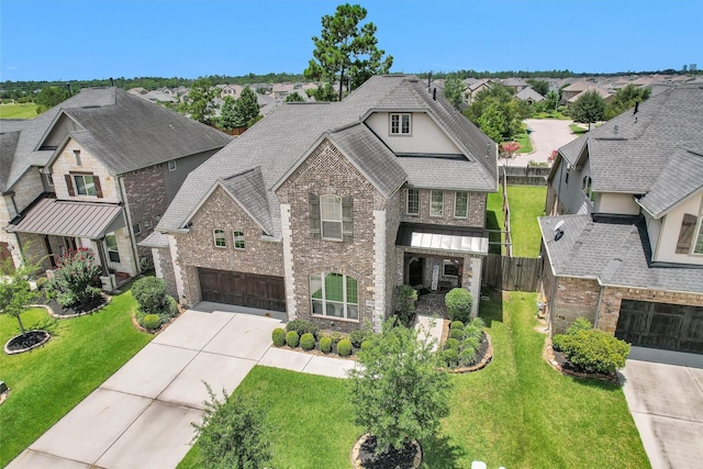 31304 New Forest Park Ln, Spring, TX 77386 - view of front of home featuring driveway, a residential view, stone siding, and a shingled roof