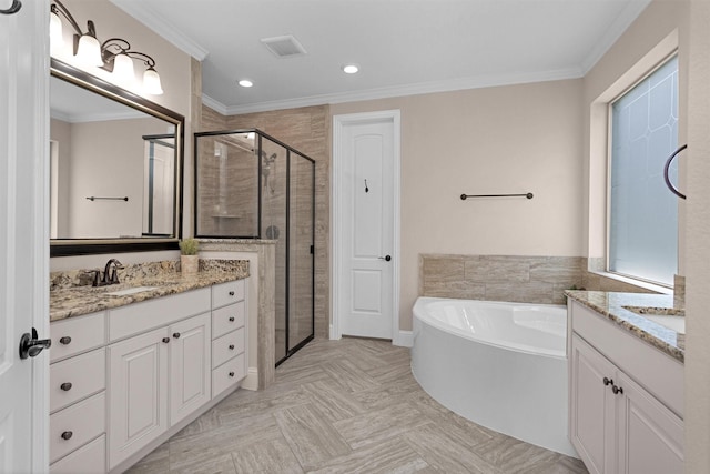 31304 New Forest Park Ln, Spring, TX 77386 - bathroom with two vanities, a shower stall, a bathtub, recessed lighting, and crown molding