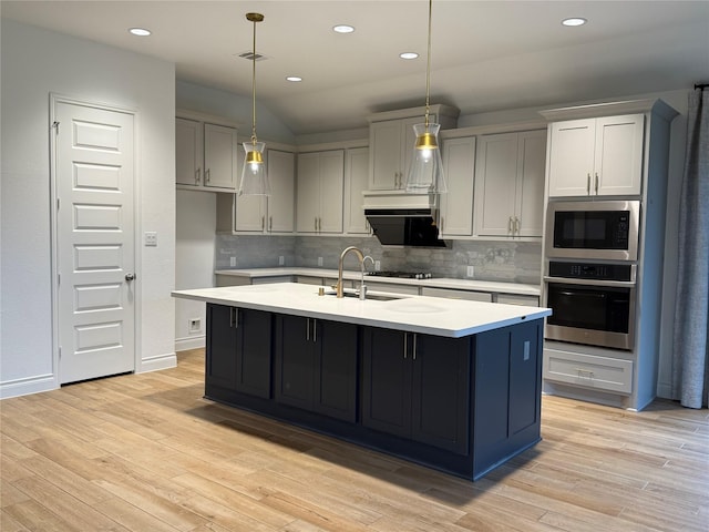 9402 Orchard Trl, Missouri City, TX 77459 - kitchen with appliances with stainless steel finishes, light countertops, tasteful backsplash, and recessed lighting