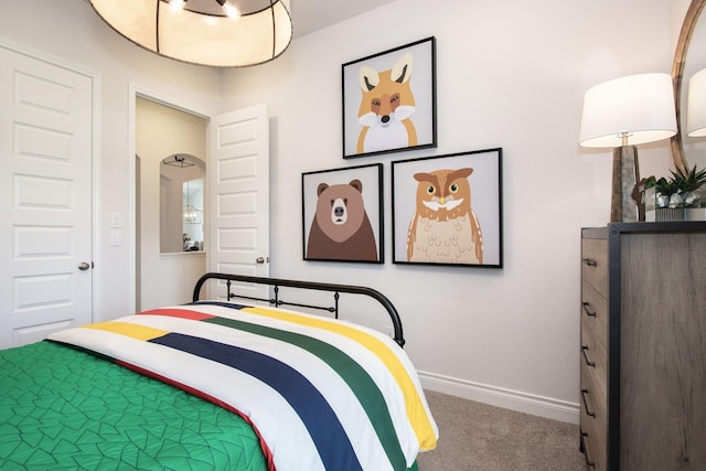 9402 Orchard Trl, Missouri City, TX 77459 - carpeted bedroom with baseboards