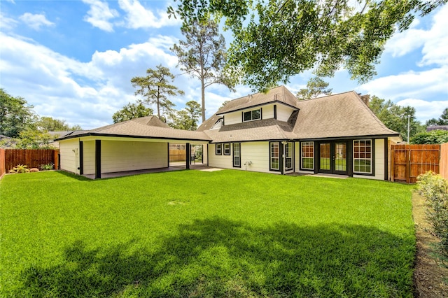 17522 Sorrel Ridge Dr, Spring, TX 77388 - rear view of property with a fenced backyard, french doors, and roof with shingles