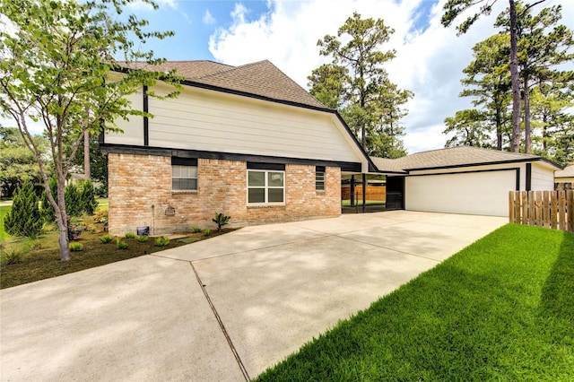 17522 Sorrel Ridge Dr, Spring, TX 77388 - view of home's exterior featuring driveway, brick siding, an attached garage, and roof with shingles