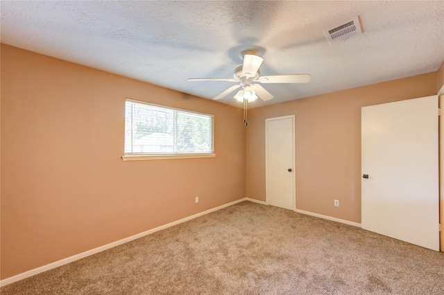 17522 Sorrel Ridge Dr, Spring, TX 77388 - unfurnished bedroom featuring carpet, a ceiling fan, and a textured ceiling