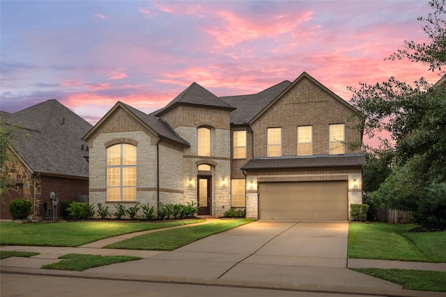 5227 Birch Falls Ln, Sugar Land, TX 77479 - french provincial home with stone siding, driveway, and brick siding
