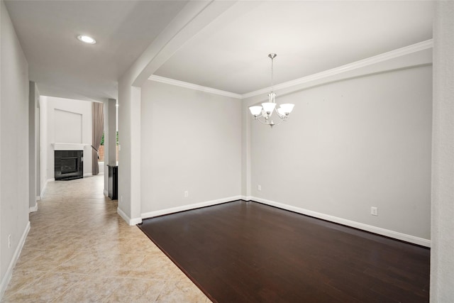5227 Birch Falls Ln, Sugar Land, TX 77479 - unfurnished room featuring crown molding, a chandelier, a fireplace, and recessed lighting