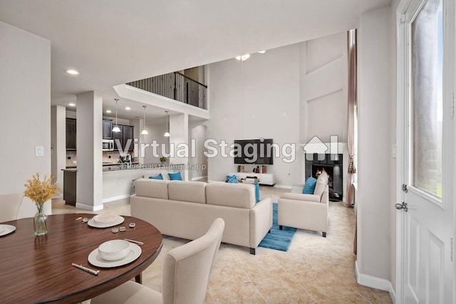 5227 Birch Falls Ln, Sugar Land, TX 77479 - living area featuring light tile patterned floors and recessed lighting