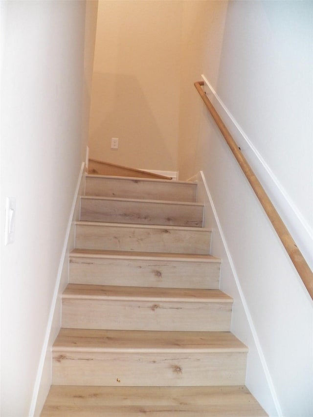 4218 Sorsby Dr, Houston, TX 77047 - stairway featuring wood finished floors