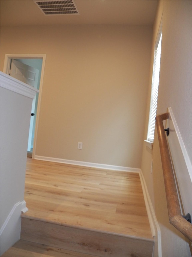 4218 Sorsby Dr, Houston, TX 77047 - stairs with wood finished floors and baseboards