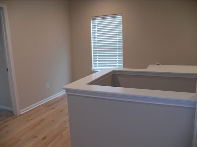 4218 Sorsby Dr, Houston, TX 77047 - hall with light wood-style floors and baseboards