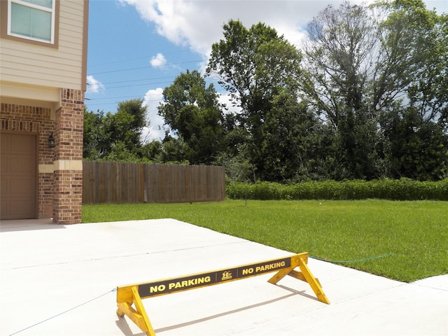 4218 Sorsby Dr, Houston, TX 77047 - view of patio featuring a garage