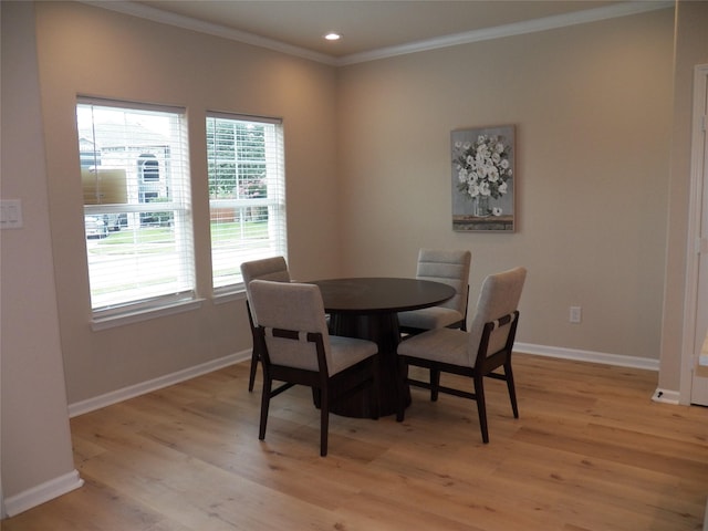 4218 Sorsby Dr, Houston, TX 77047 - dining area featuring ornamental molding, light wood-style flooring, and recessed lighting