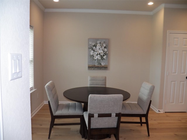 4218 Sorsby Dr, Houston, TX 77047 - dining space with light wood-type flooring, ornamental molding, and recessed lighting